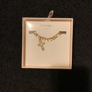 gold bracelet with cross